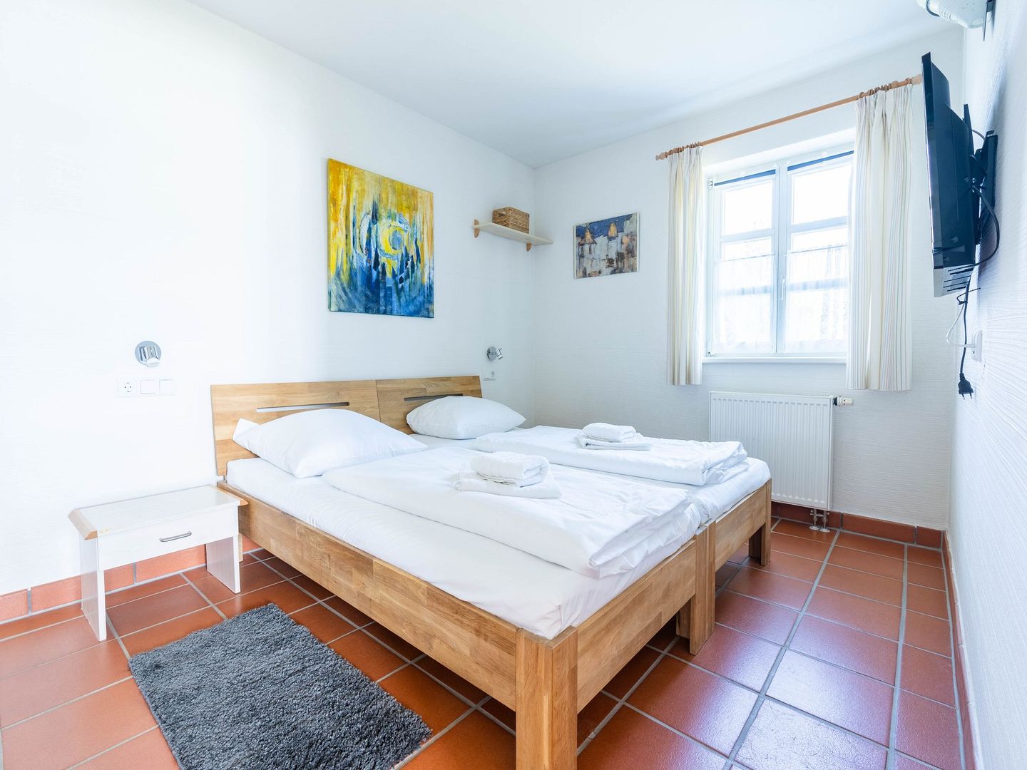 Feriendorf Rugana Komfort Ferienwohnung mit 1 Schlafzimmer und Terrasse (A56) Insel Rügen - Schlafzimmer