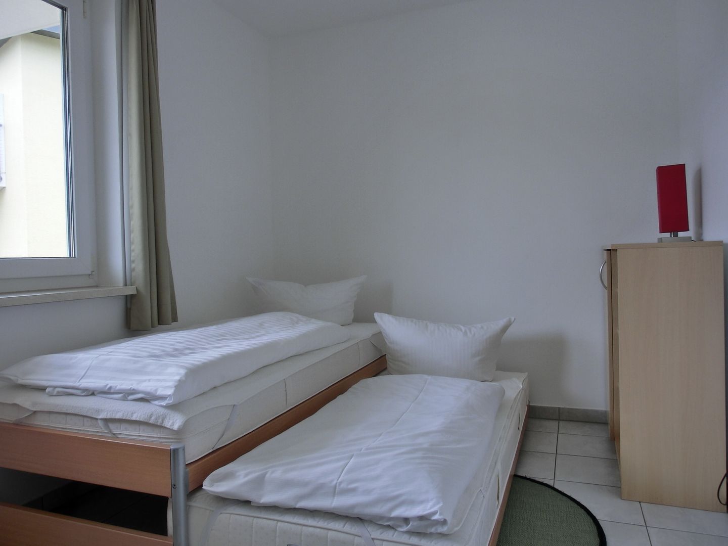  Ferienwohnung KWE 12 OG Graal-Müritz Küstenwald - Schlafzimmer