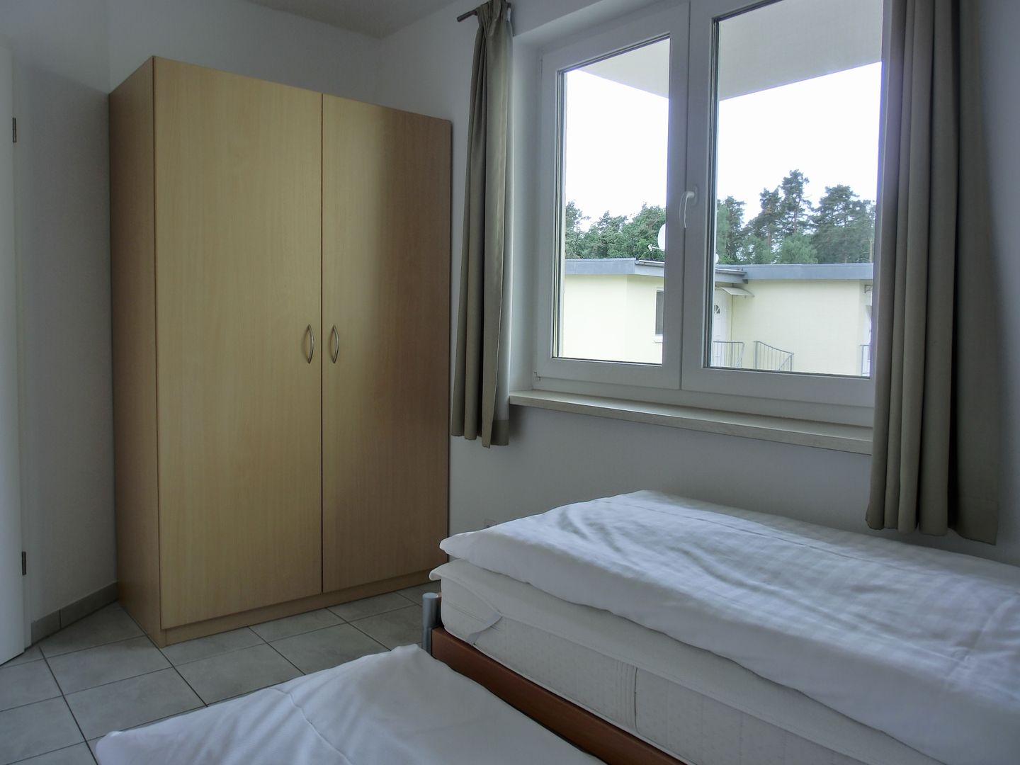  Ferienwohnung KWE 12 OG Graal-Müritz Küstenwald - Schlafzimmer