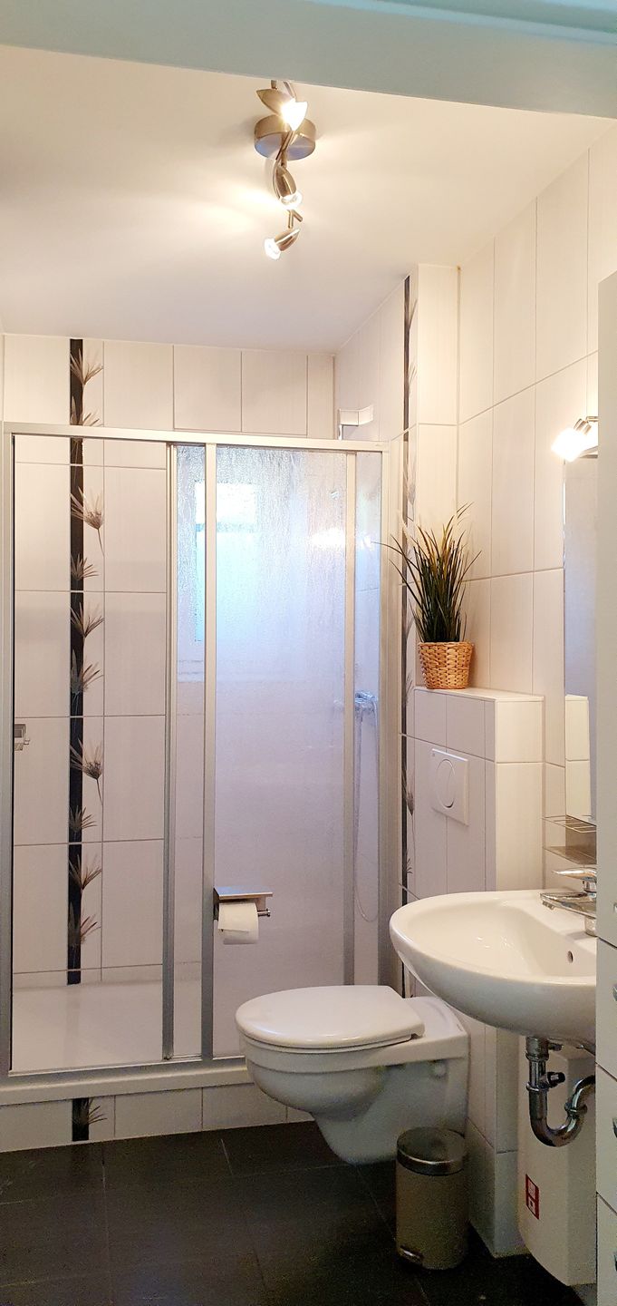  Ferienwohnung KWE 24EG - "meerLiebe" Graal-Müritz Küstenwald - Badezimmer