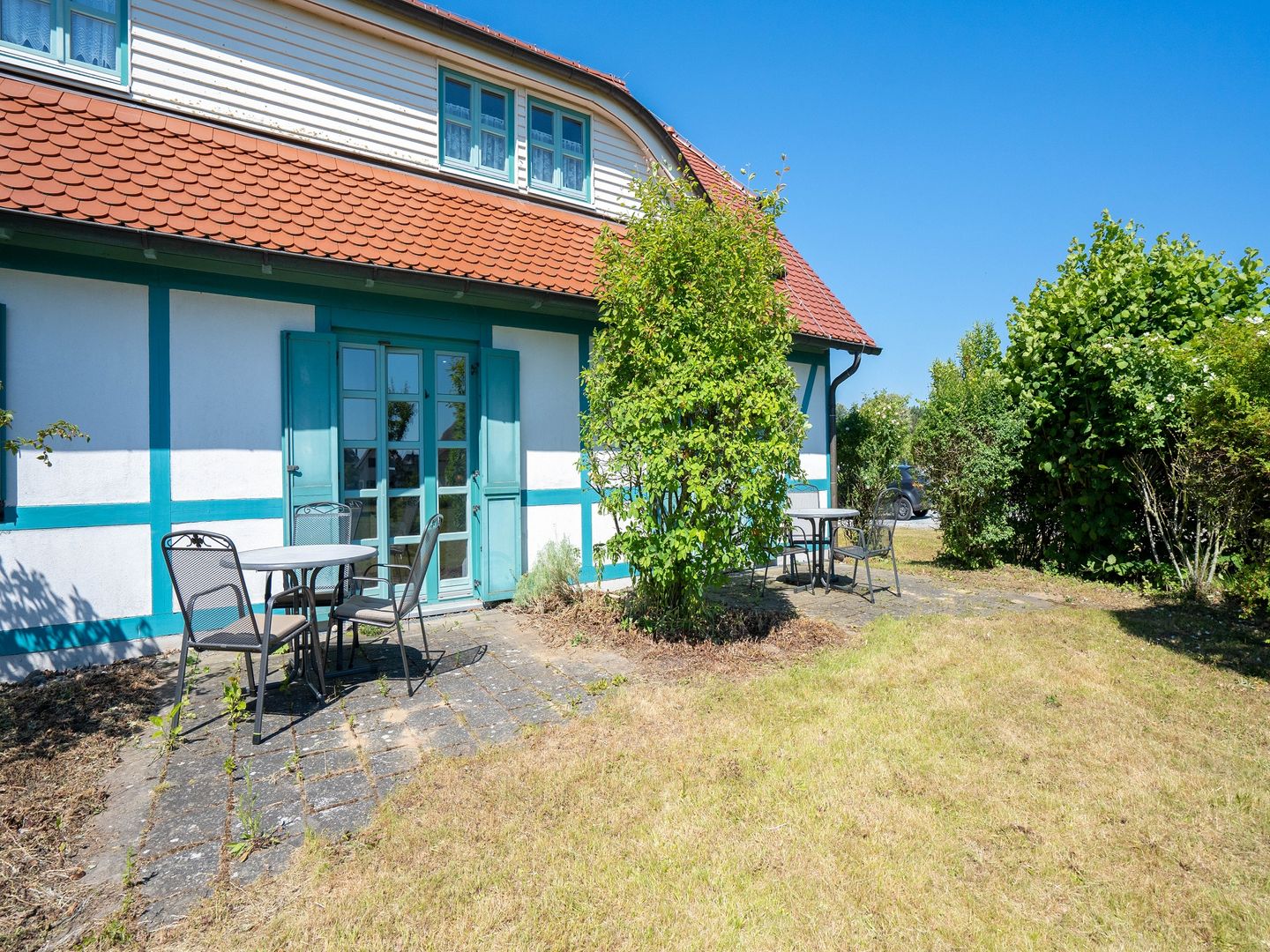 Feriendorf Rugana Klassik Ferienwohnung mit 2 Schlafzimmern und 2 Terrassen (D55) Insel Rügen - Terrasse