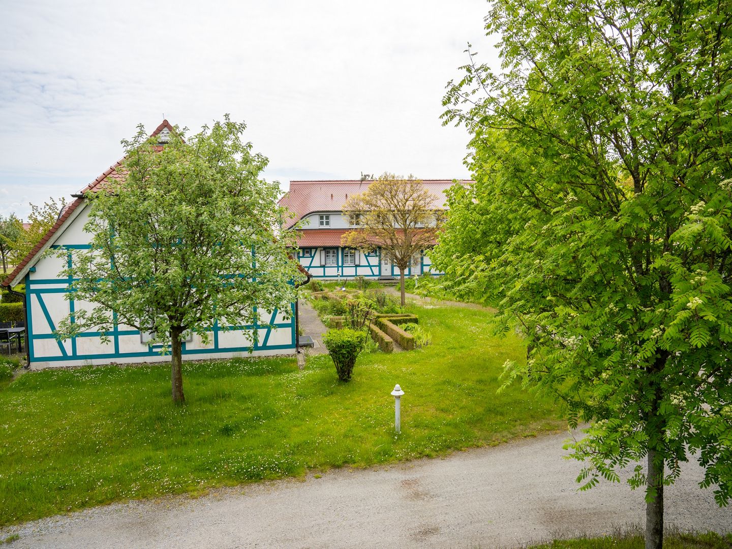 Feriendorf Rugana Komfortplus Ferienwohnung mit 1 Schlafzimmer (C31) Insel Rügen - Gartenblick