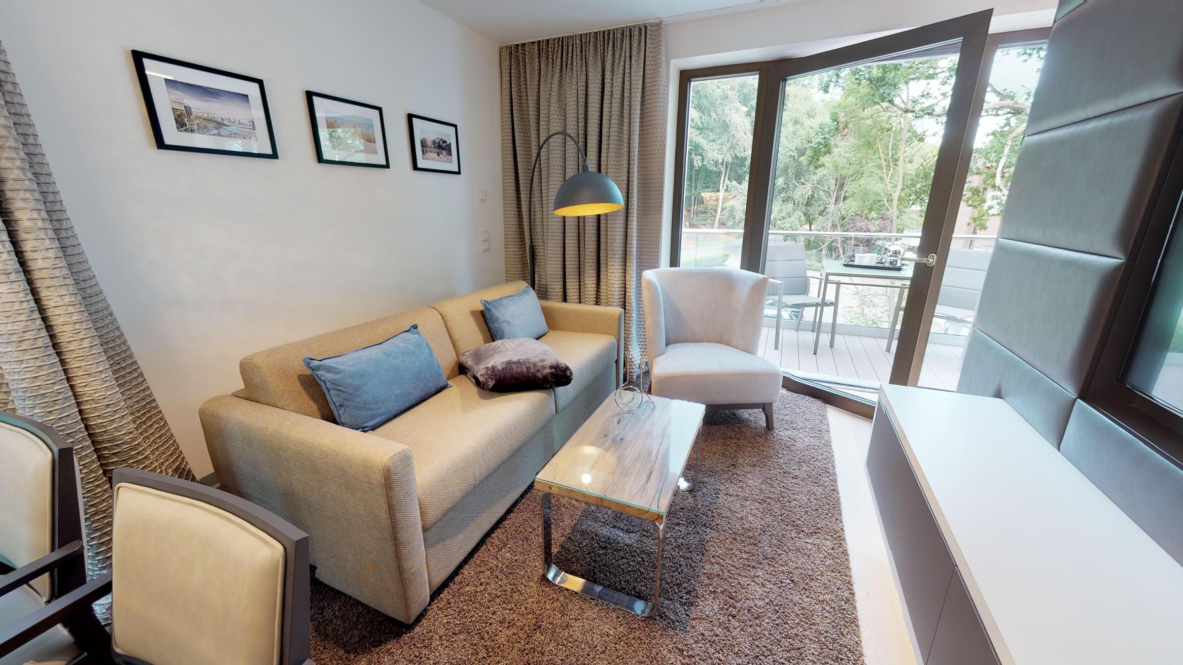 Luxusapartment mit eigener Sauna & Sonnenbalkon – nur Minuten vom Strand entfernt