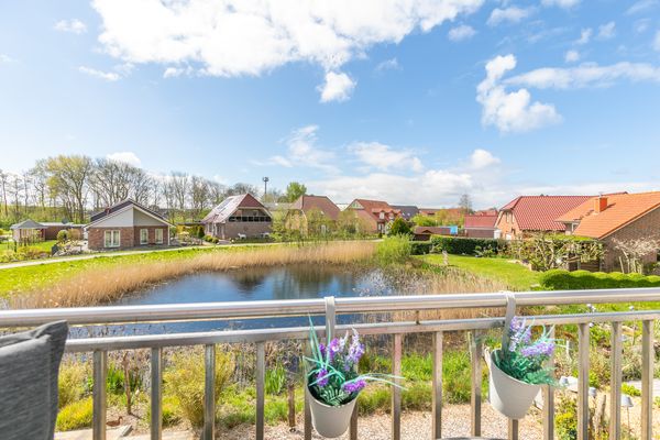 Haus am Teich 2 Büsum – ruhige Ferienwohnung mit Balkon