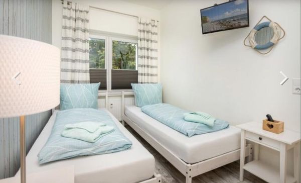 Schlafzimmer 2 mit zwei Einzelbetten