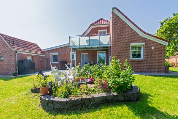 Foto 1 Ferienwohnung Ostfriesland Dornum & Umgebung Huus op de Wurf (Objekt 77684) buchen