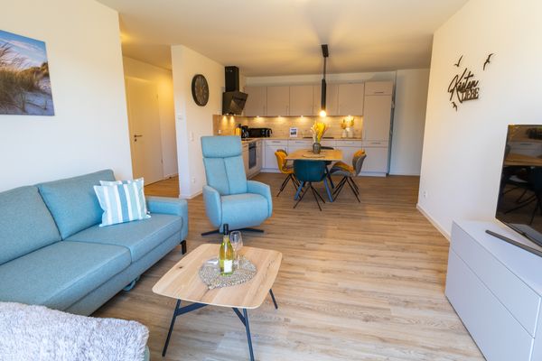 Küstenliebe – Nordseeluft genießen. Sauna. Dachterrasse. Familienzeit.