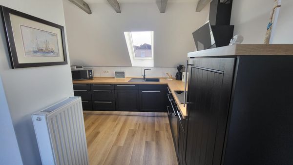 Foto 2 Ferienhaus Ostfriesland Krummhörn & Umgebung Ferienhaus Dinas Huus (Objekt 99641) suchen