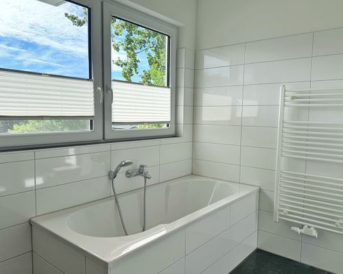 Moderne Erdgeschosswohnung mit 3 Schlafzimmern und Kamin