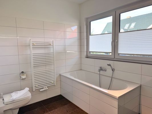 Moderne Erdgeschosswohnung mit 3 Schlafzimmern und Kamin