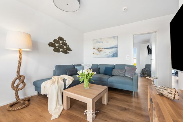  Kaptain's Strandhuus - Wohnzimmer