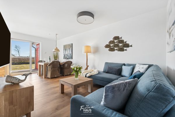  Kaptain's Strandhuus - Wohnzimmer