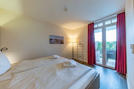 Resort Deichgraf Resort Deichgraf 27-05 Wremen - Schlafzimmer mit Doppelbett