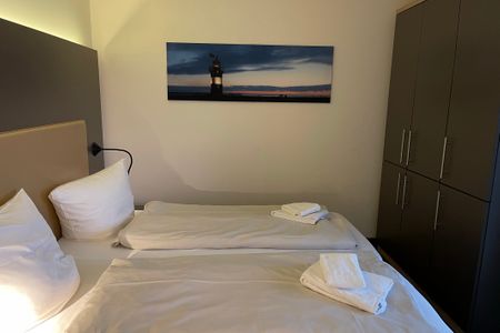 Resort Deichgraf Resort Deichgraf 27-12 Wremen - Schlafzimmer mit Doppelbett