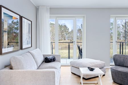 Strandresidenzen Binz-Prora Strandresidenzen Binz-Prora D1.1 Rügen - Wohn-Essbereich mit Couch