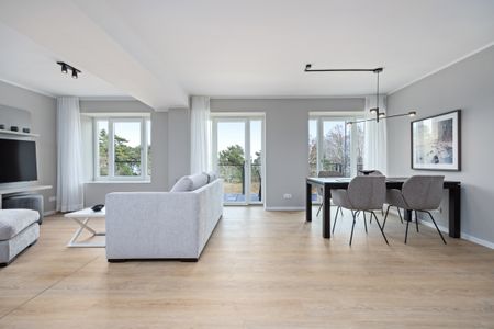 Strandresidenzen Binz-Prora Strandresidenzen Binz-Prora D3.4 Rügen - Wohn-Essbereich mit Couch