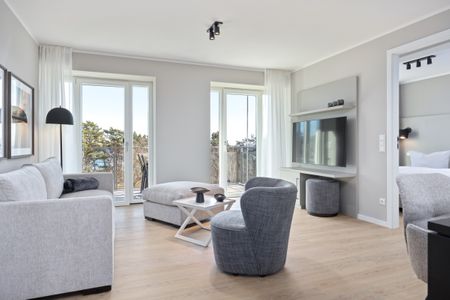 Strandresidenzen Binz-Prora Strandresidenzen Binz-Prora D4.1 Rügen - Wohn-Essbereich mit Couch