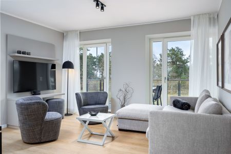 Strandresidenzen Binz-Prora Strandresidenzen Binz-Prora D1.3 Rügen - Wohn-Essbereich mit Couch