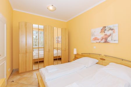 Dünenschloss Dünenschloss 1-26 Kühlungsborn - Schlafzimmer mit Doppelbett