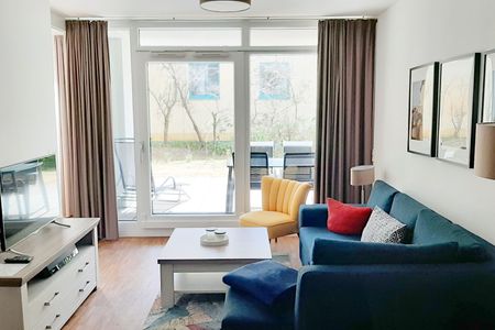 DünenResort Binz DünenResort Binz 413 Rügen - Wohn-Essbereich mit Couch