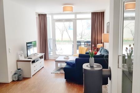 DünenResort Binz DünenResort Binz 413 Rügen - Wohn-Essbereich mit Couch