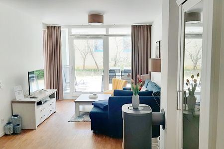 DünenResort Binz DünenResort Binz 413 Rügen - Wohn-Essbereich mit Couch