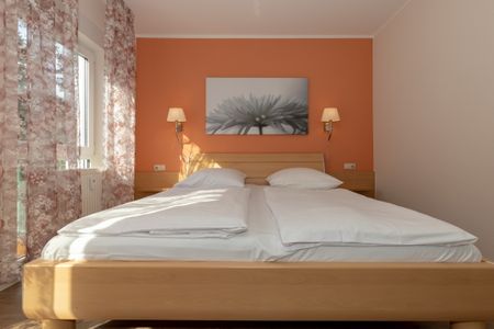 Ostseeallee 32b Ostseeallee 32b 1-1 Kühlungsborn - Schlafzimmer mit Doppelbett