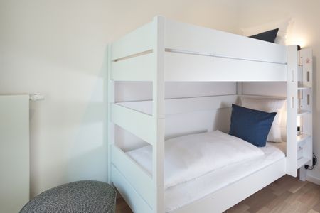Lüttjeod Apartmentvilla Lüttjeod Apartmentvilla 06 Langeoog - Schlafzimmer mit Etagenbett