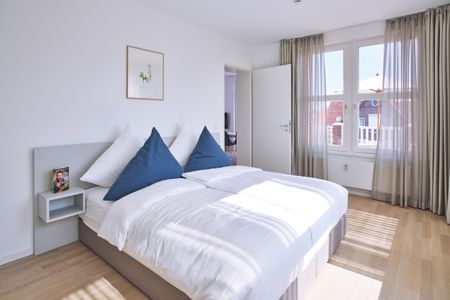 Lüttjeod Apartmentvilla Lüttjeod Apartmentvilla 08 Langeoog - Schlafzimmer mit Doppelbett