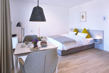 Lüttjeod Apartmentvilla Lüttjeod Apartmentvilla 14 Langeoog - Wohn-Essbereich mit Doppelbett