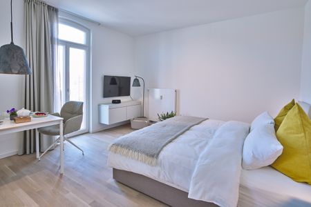 Lüttjeod Apartmentvilla Lüttjeod Apartmentvilla 14 Langeoog - Wohn-Essbereich mit Doppelbett