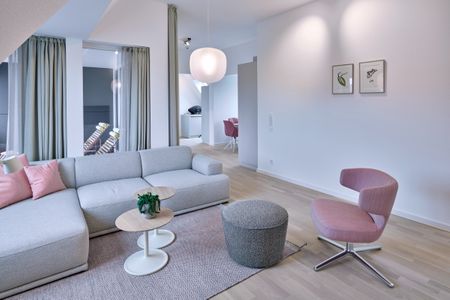 Lüttjeod Apartmentvilla Lüttjeod Apartmentvilla 16 Langeoog - Wohn-Essbereich mit Couch