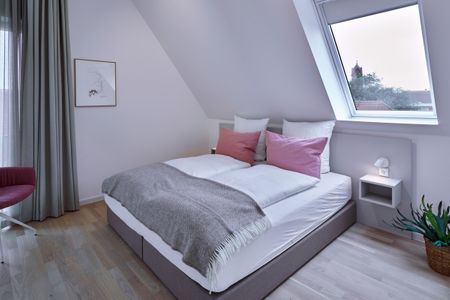 Lüttjeod Apartmentvilla Lüttjeod Apartmentvilla 16 Langeoog - Schlafzimmer mit Doppelbett