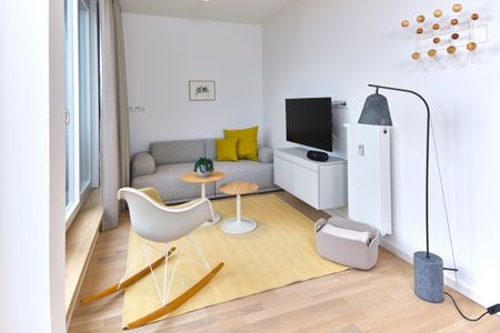 Lüttjeod Apartmentvilla Lüttjeod Apartmentvilla 18 Langeoog - Wohn-Essbereich mit Couch