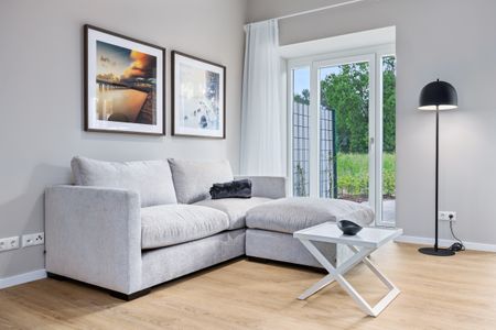 Strandresidenzen Binz-Prora Strandresidenzen Binz-Prora V0.2 Rügen - Wohn-Essbereich mit Couch