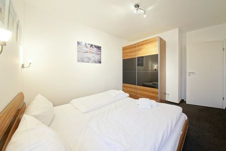 NordseeResort Friesland NordseeResort Friesland 51-1-S Schillig - Schlafzimmer mit Doppelbett