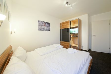 NordseeResort Friesland NordseeResort Friesland 51-1-S Schillig - Schlafzimmer mit Doppelbett