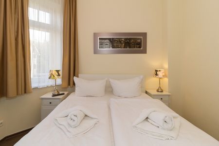 Dünenschloss Dünenschloss 1-17 Kühlungsborn - Schlafzimmer mit Doppelbett