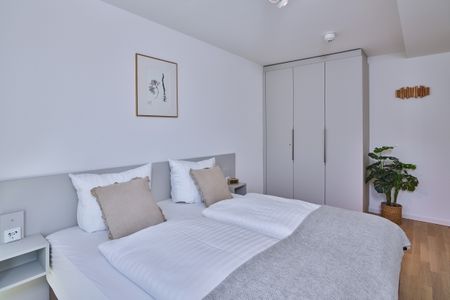 Lüttjeod Apartmentvilla Lüttjeod Apartmentvilla 04 Langeoog - Schlafzimmer mit Doppelbett