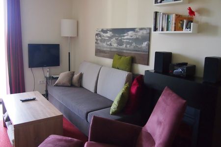 Resort Deichgraf Resort Deichgraf 31-06 Wremen - Wohn-Essbereich mit Couch