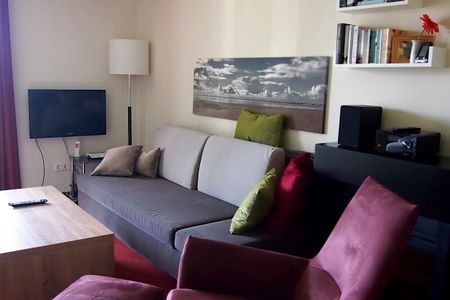 Resort Deichgraf Resort Deichgraf 31-06 Wremen - Wohn-Essbereich mit Couch