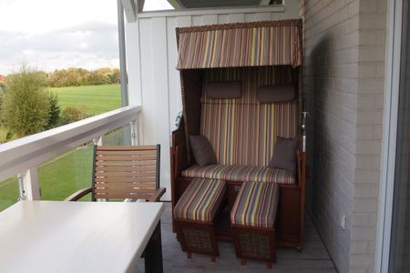 Resort Deichgraf Resort Deichgraf 31-06 Wremen - Balkon mit Gartenmöbeln