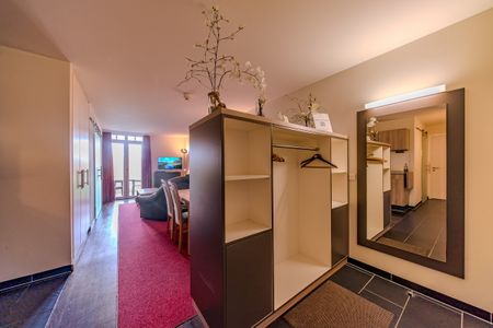 Resort Deichgraf Resort Deichgraf 31-01 Wremen - Wohn-Essbereich mit Couch