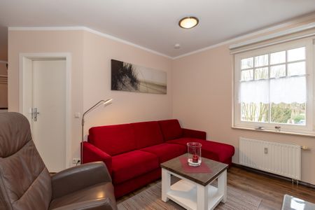 Ostseewelle Ostseewelle 14 Kühlungsborn - Wohnbereich mit Couch und Flatscreen TV