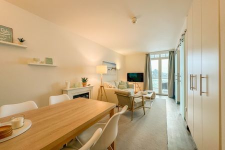 Resort Deichgraf Resort Deichgraf 31-10 Wremen - Wohn-Essbereich mit Couch