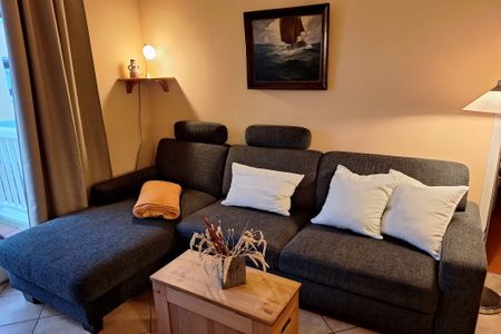 Apartment-Residenz Ostseestrand Apartment-Residenz Ostseestrand 18 Kühlungsborn - Wohn-Essbereich mit Couch