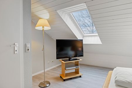Urlauberdorf Urlauberdorf 33b Boltenhagen - Schlafzimmer mit Doppelbett und Flatscreen TV - gbmv0-01 - Großenbrode
