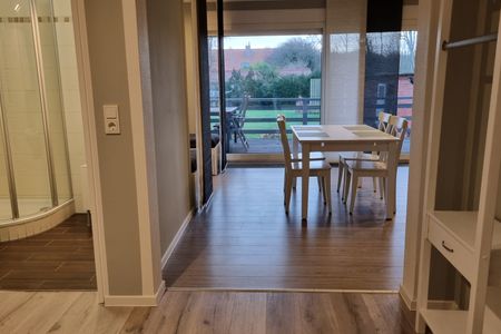 Haus Spökenkieker Loppersum Kiebitzdelle Dünen - Flur Blick ins Bad und Wohnzimmer