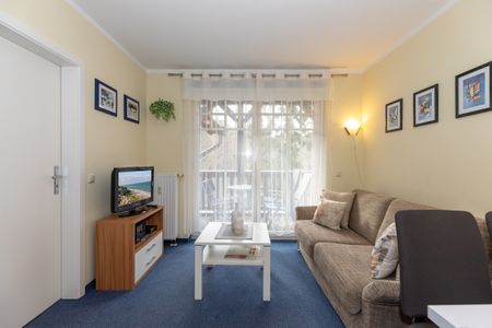 Ostseewelle Ostseewelle 19 Kühlungsborn - Wohn-Essbereich mit Couch