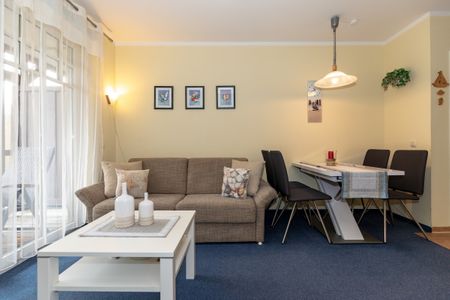 Ostseewelle Ostseewelle 19 Kühlungsborn - Wohn-Essbereich mit Couch